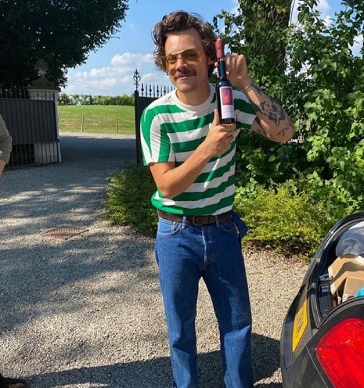 Harry Styles' New Mustache: A 70s Vibe In London Harry Styles' New Mustache: A 70s Vibe In London