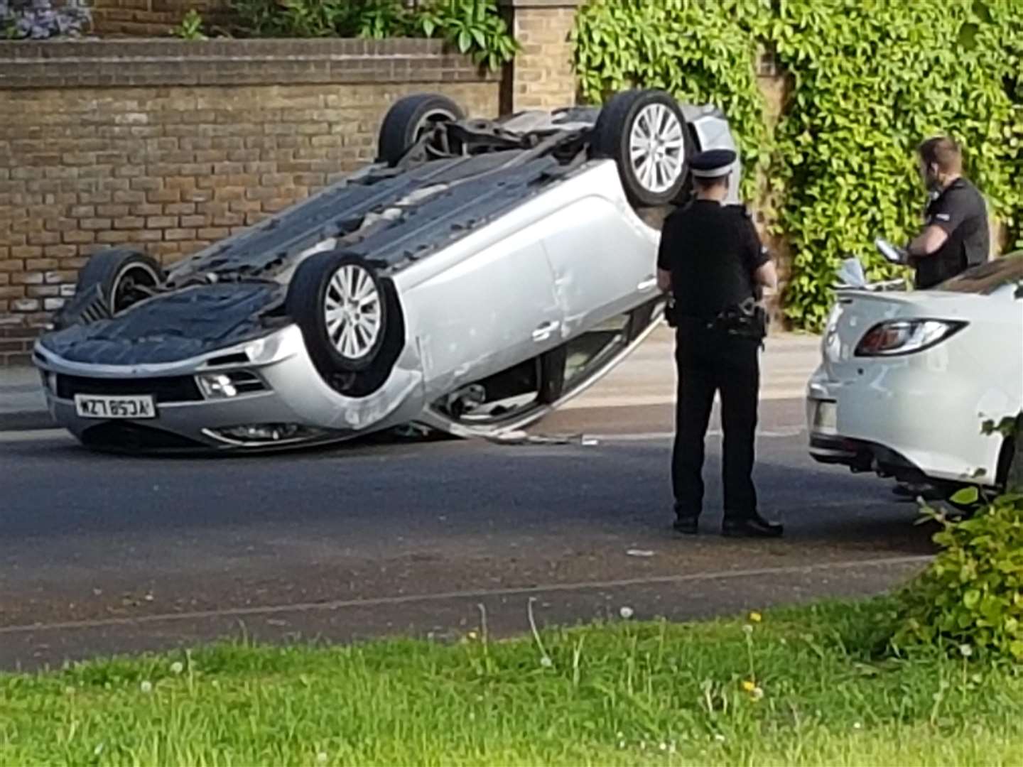 M56 Crash: Paramedics Respond To Overturned Car, Treat Injuries M56 Crash: Paramedics Respond To Overturned Car, Treat Injuries