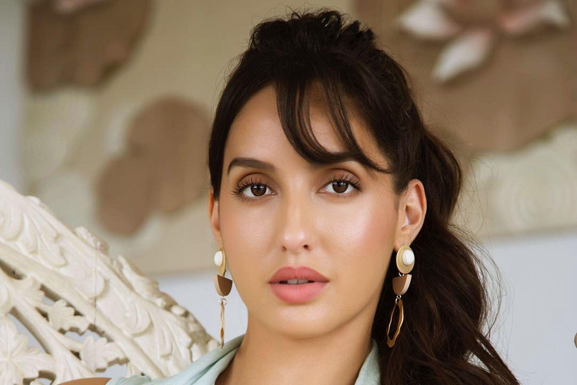Nora Fatehi's Captivating All-Black Billboard Image Nora Fatehi's Captivating All-Black Billboard Image