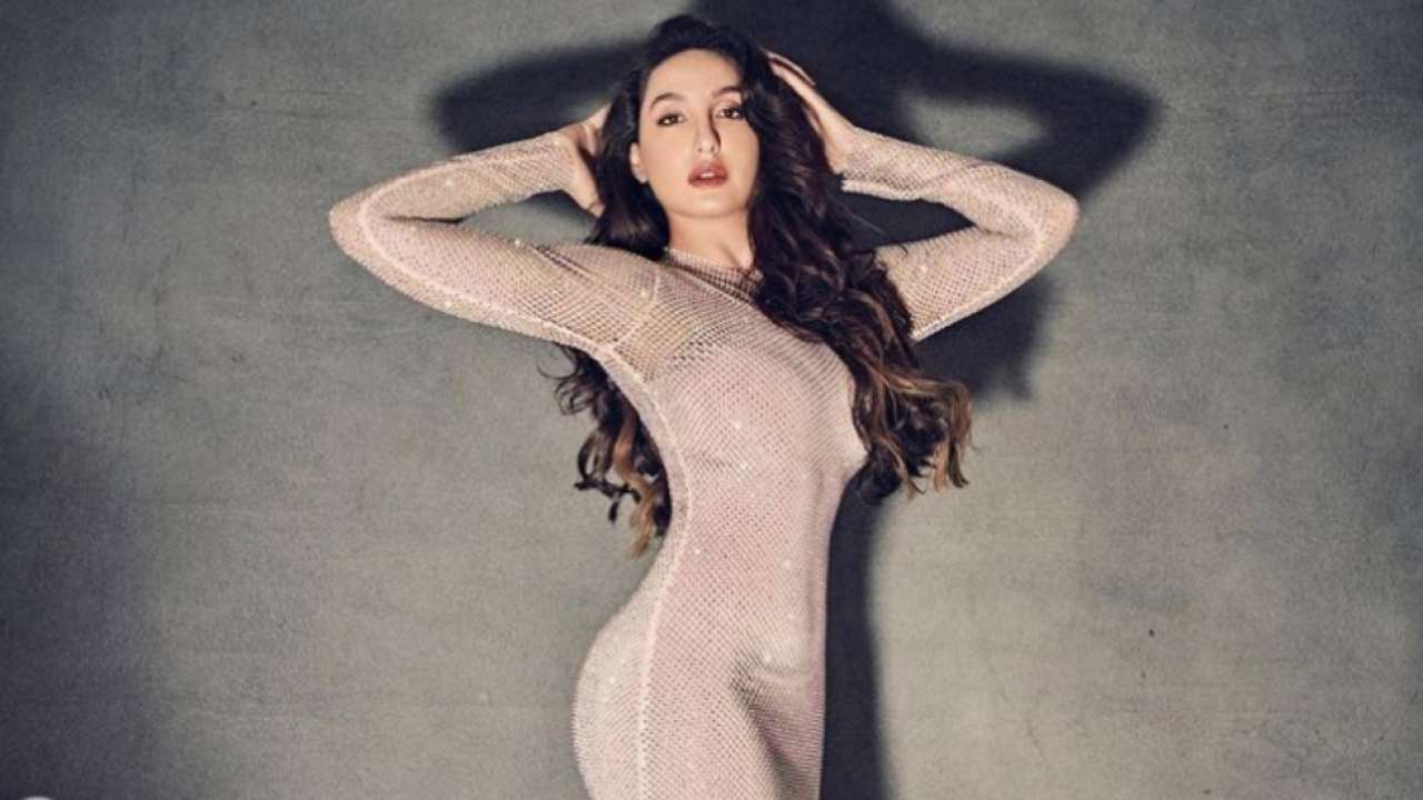 Nora Fatehi's Sizzling Red Bikini Beach Look: Bollywood News Nora Fatehi's Sizzling Red Bikini Beach Look: Bollywood News